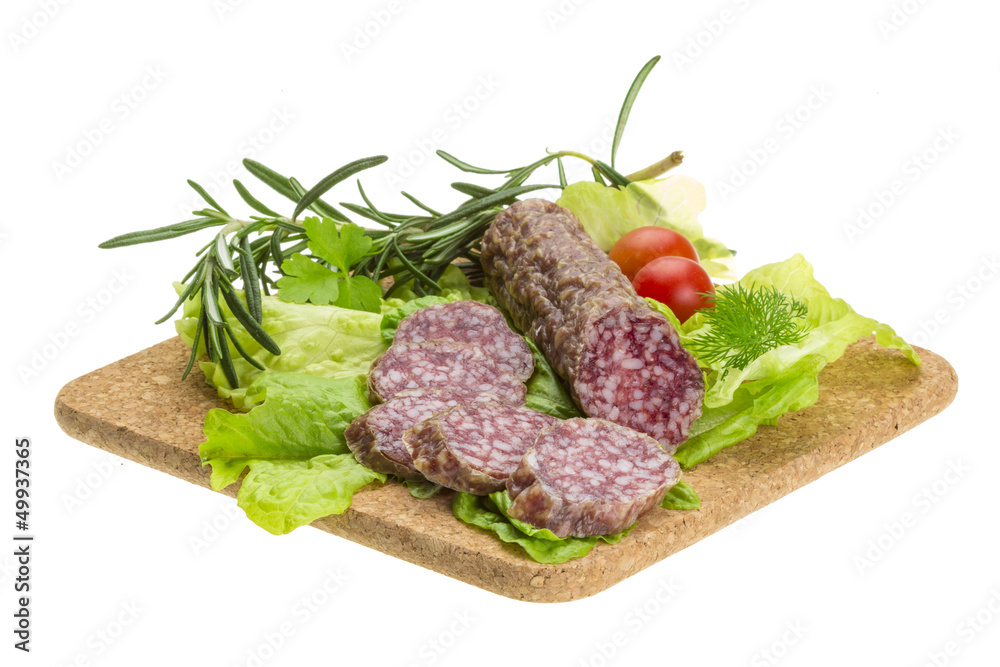 Salami with rosemary, salad and tomatoes Salami with rosemary, salad and tomatoes