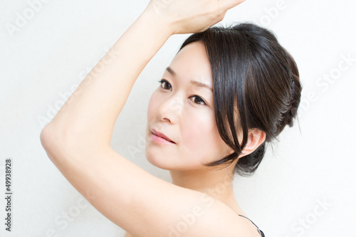 Beautiful asian woman on white background