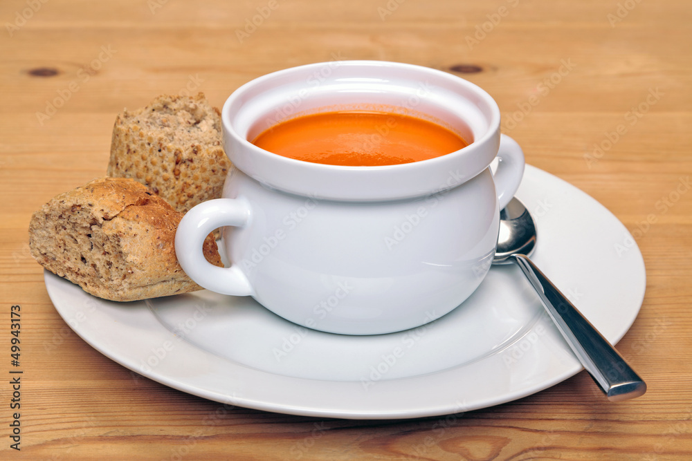 Bowl of tomatoe soup with brown bread Bowl of tomatoe soup with brown bread