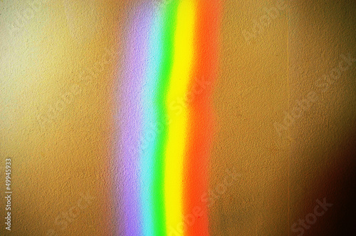 artificial rainbow light concrete wall background