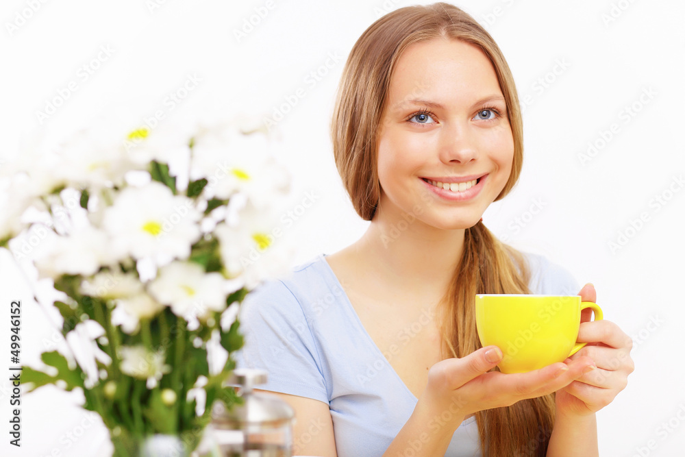 Beautiful young woman drinking tea Beautiful young woman drinking tea