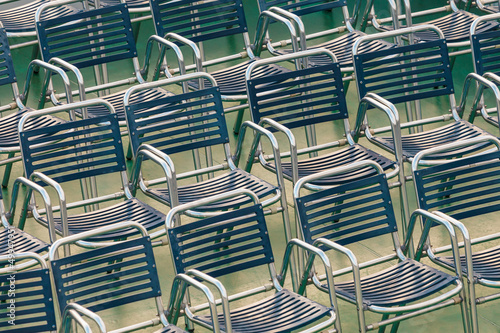 Rows of outdoor steel chairs