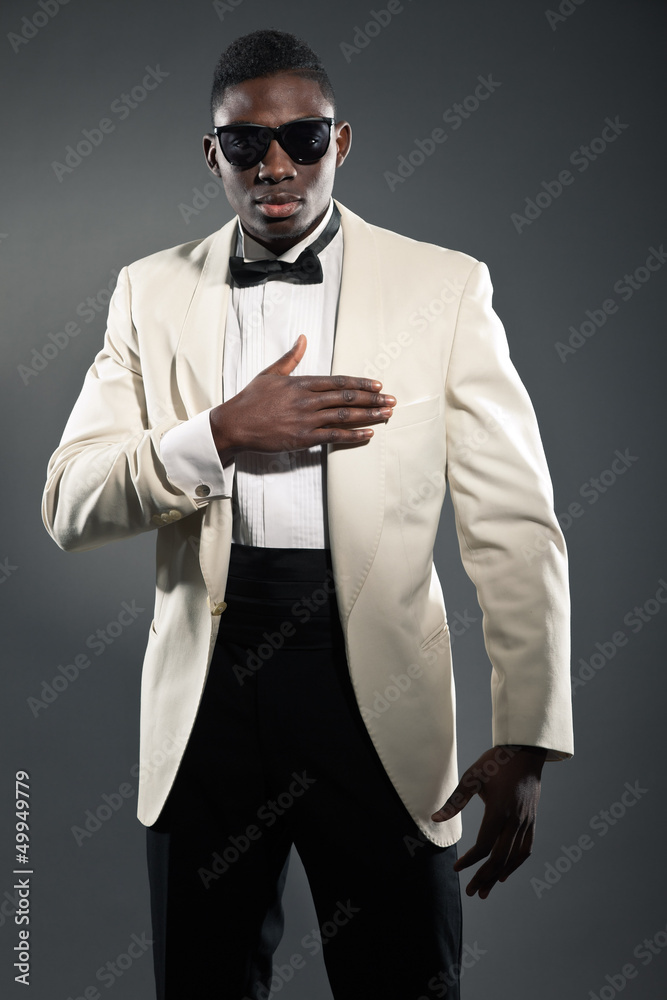 Stylish black american man in suit with sunglasses. Fashion stud