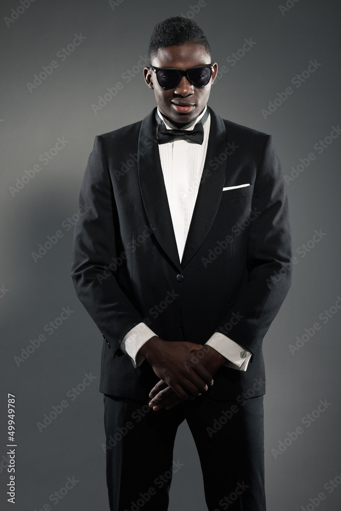 Cool stylish black american man in gala suit. Fashion shot. Cool stylish black american man in gala suit. Fashion shot.