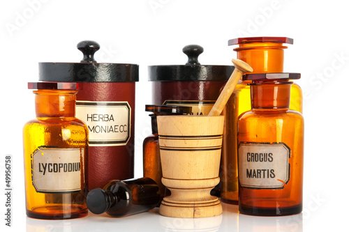 apothecary pots with ingredients for medicins photo
