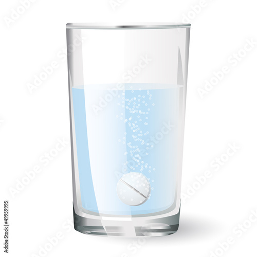 effervescent tablet in glass of water