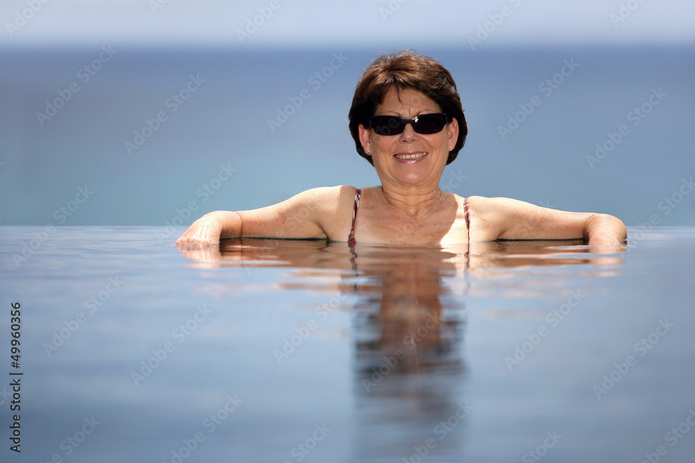 Middle-aged woman in a swimming pool