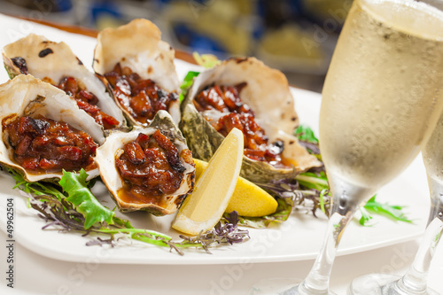 Oysters kilpatrick photo