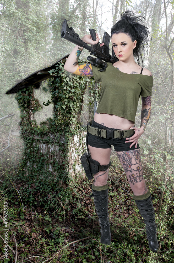 Naklejka premium Woman with Assault Rifle