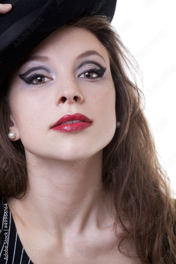 Close up of a beautiful girl wearing a hat isolated on white Close up of a beautiful girl wearing a hat isolated on white