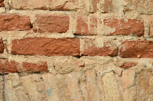 ancient brick wall repair background closeup
