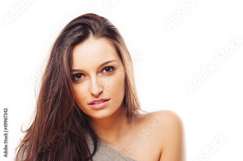 Beautiful brunette woman intense close up portrait 