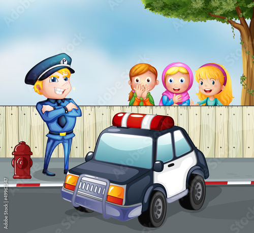 A policeman and the three girls outside the fence