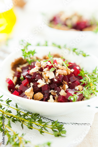 slices of beet with crushed nuts, salad