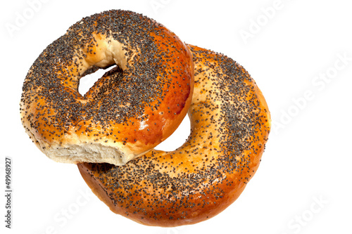 bagels with poppy seeds on white background