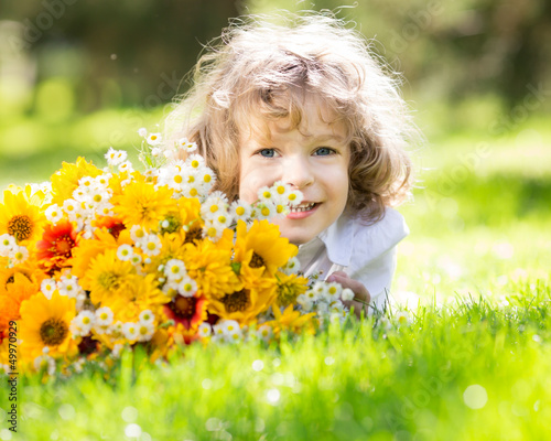 Child with bouquet of flowers