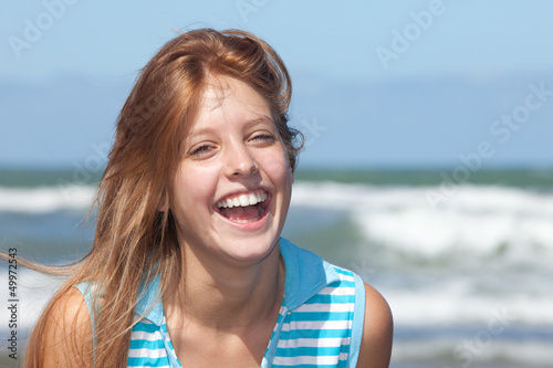laughing girl at the beach