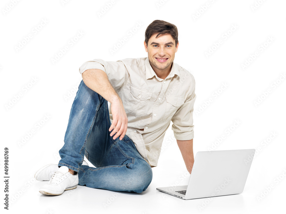 Portrait of happy man working on laptop Portrait of happy man working on laptop