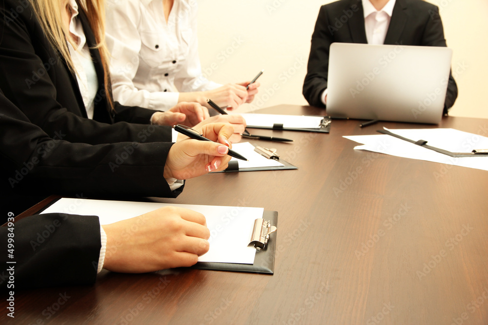 Close up of business people hands during teamwork Close up of business people hands during teamwork