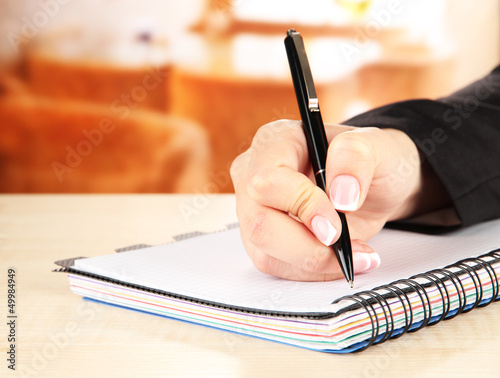 Hand write on notebook, on bright background