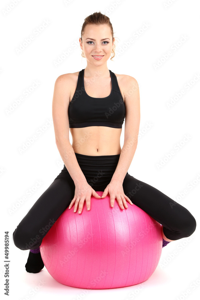 Young woman doing fitness exercises with gym ball isolated Young woman doing fitness exercises with gym ball isolated