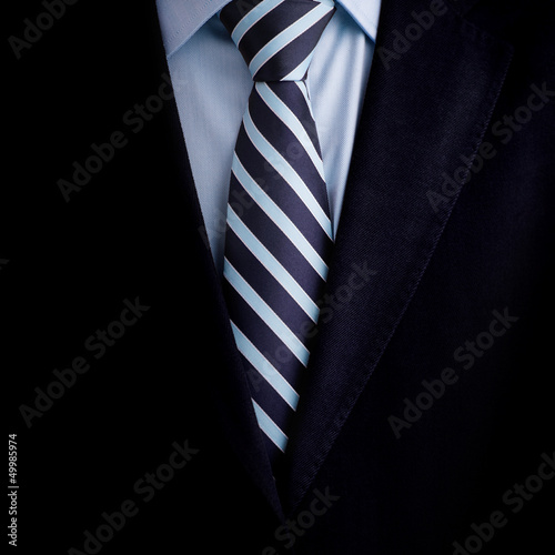 Fotografia Black business suit with a tie background