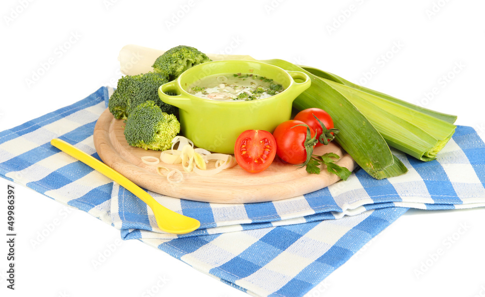 Diet soup with vegetables in pan isolated on white Diet soup with vegetables in pan isolated on white
