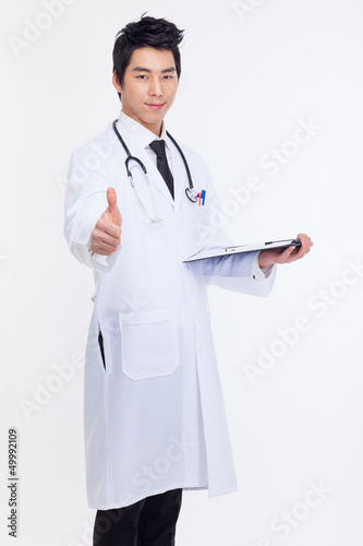 Young Asian doctor showing thumb