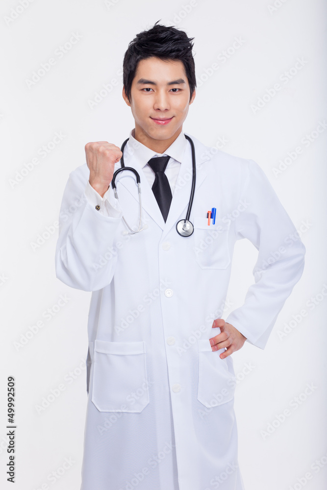 Young Asian showing fist Young Asian showing fist