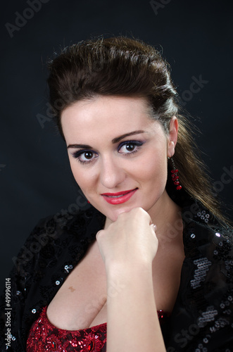 Portrait of young beautiful soprano singer