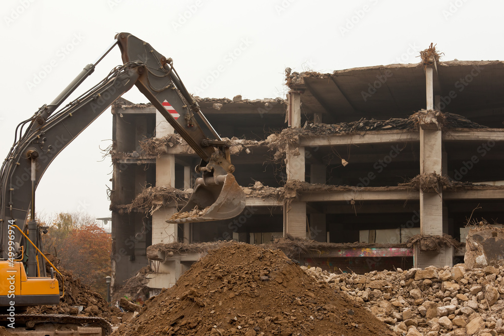 Destruction of concrete building with equipment