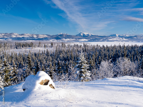 Scenic winter at frozen Lake Laberge Yukon Canada photo