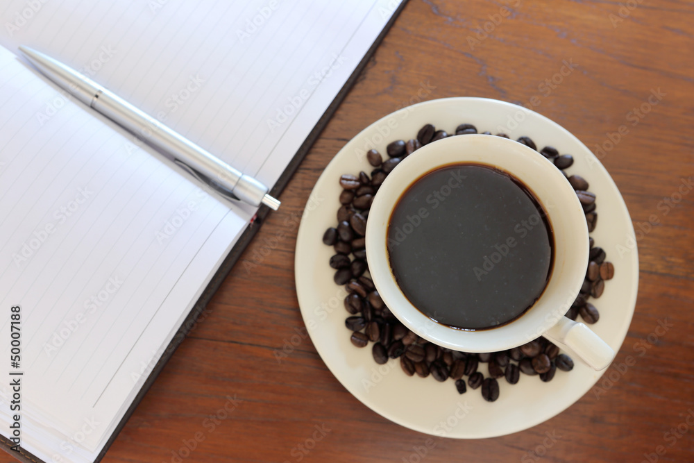 coffee cup with note book