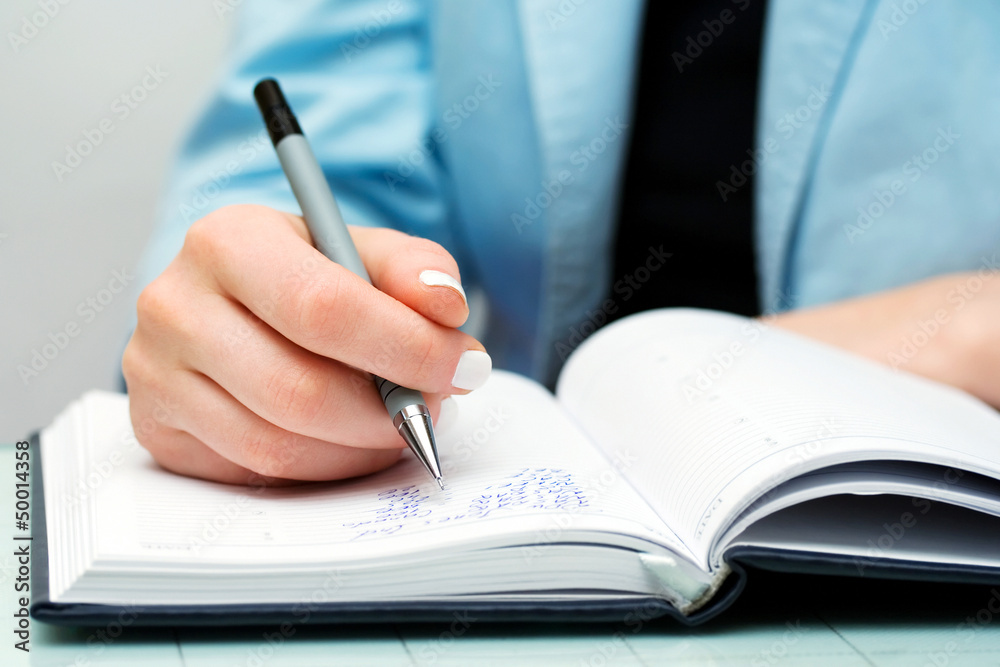 Female hand writing Female hand writing