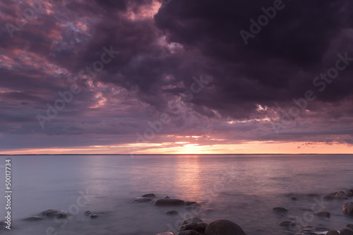 Beautiful ocean sunrise  wide angle photo