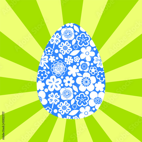 Blue easter egg on sun rays...