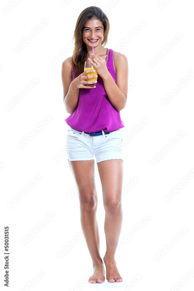 Beautiful barefoot young woman drinking orange juice. Beautiful barefoot young woman drinking orange juice.
