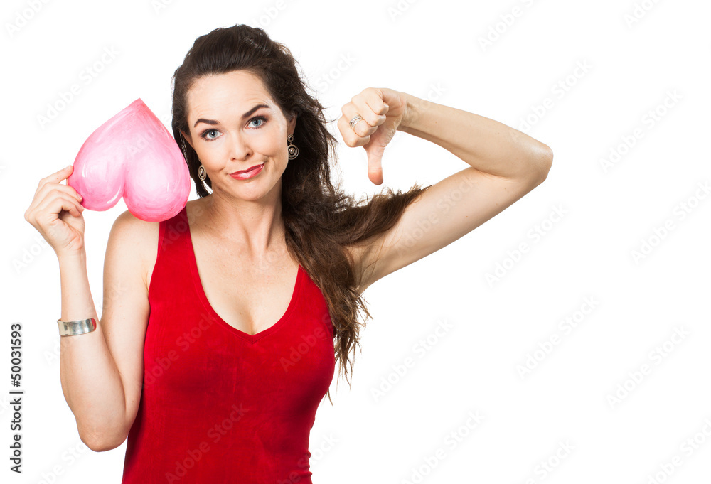 Beautiful sad woman holding red love heart. Beautiful sad woman holding red love heart.