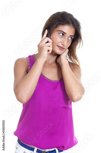 Beautiful girl on the phone. Smiling about good news.
