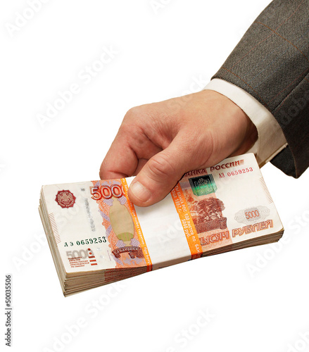 stack of banknotes in a man's hand