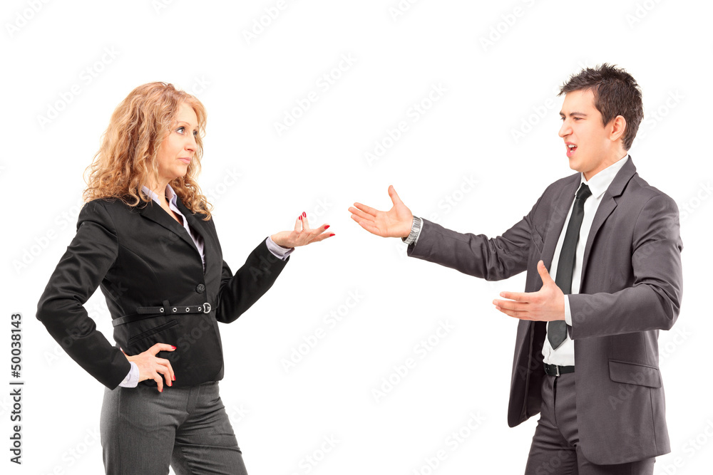 Businesswoman having an argument with a young businessman Businesswoman having an argument with a young businessman