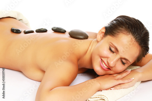 An attractive woman getting spa treatment,