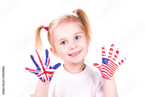 American and English flags on child's hands.