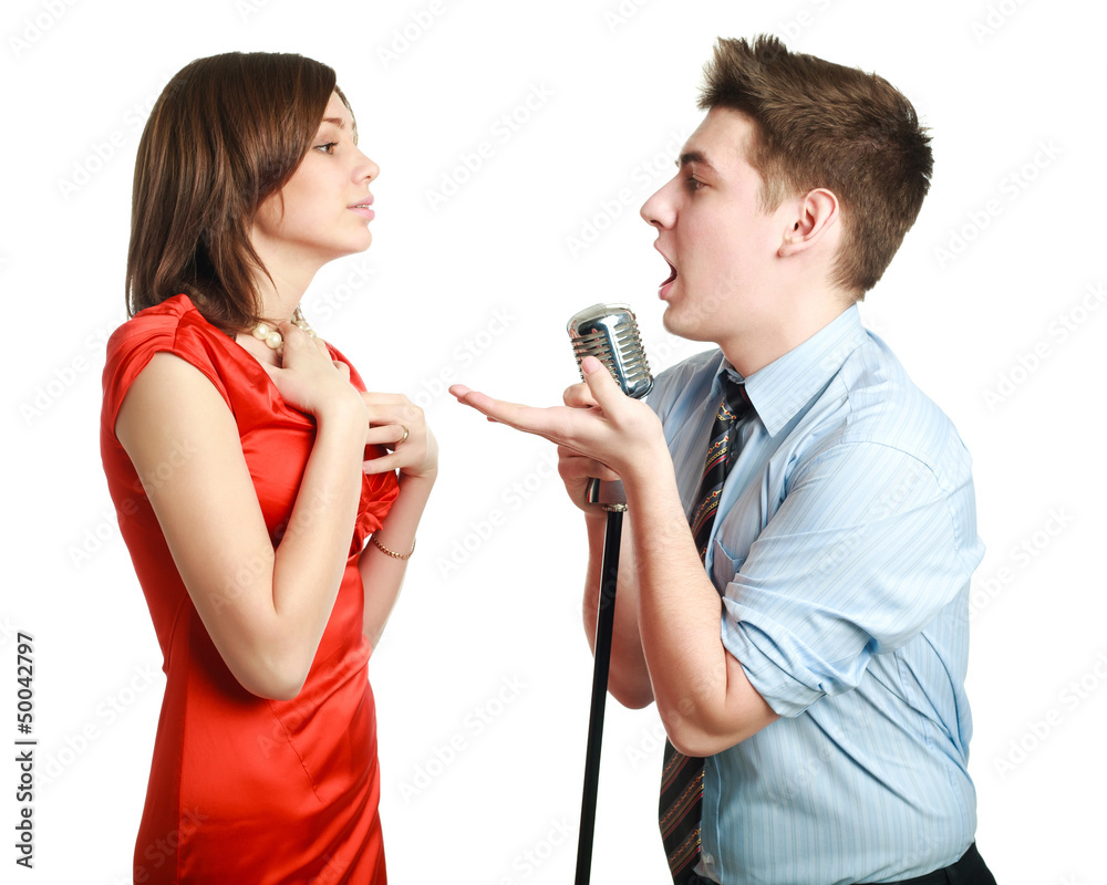 Young guy singing to a pretty girl Young guy singing to a pretty girl