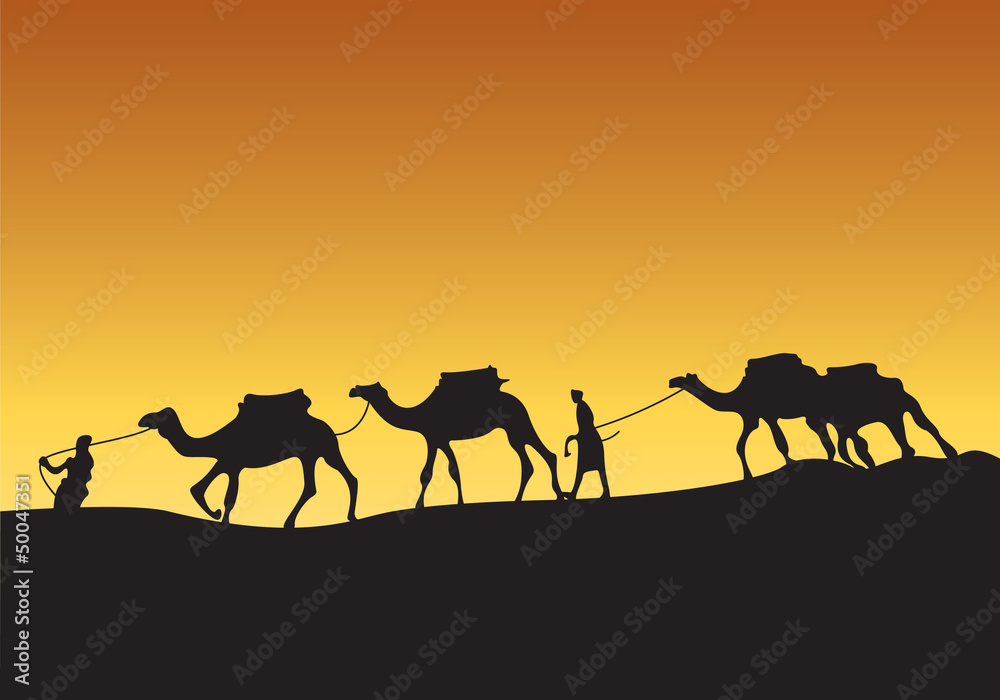 Silhouette of camel caravan with people in the desert at sunset