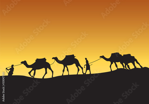 Silhouette of camel caravan with people in the desert at sunset © Eightshot Studio