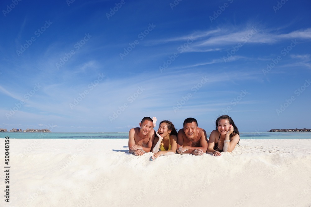 Fototapeta premium group of happy young people have fun on bach