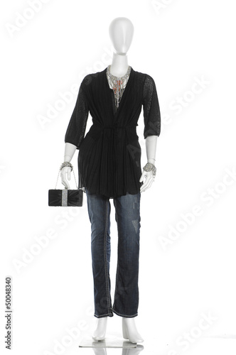 full length fashion female clothes with shoes on a mannequin photo