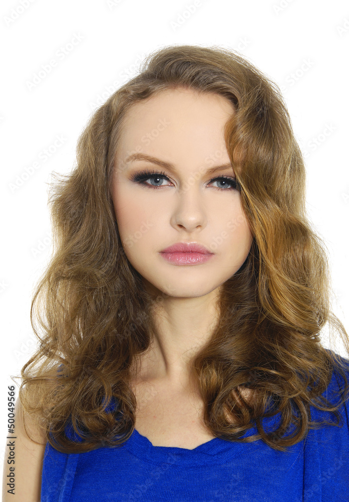 Fashion model in blue clothes standing posing Fashion model in blue clothes standing posing