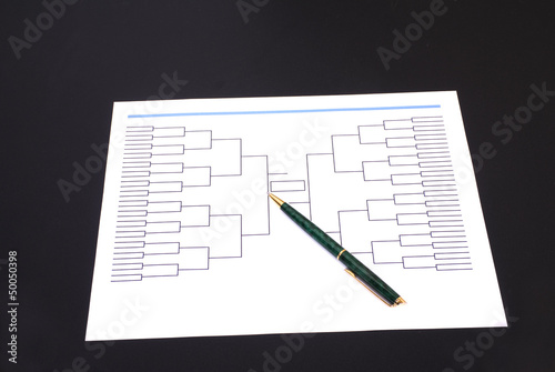 March Madness Pen and Blank Tournament Bracket photo